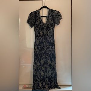 “Vintage” Black short sleeve beaded dress.